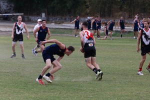 Player of the Tournament Tommy Doer dancing around his HK opposition